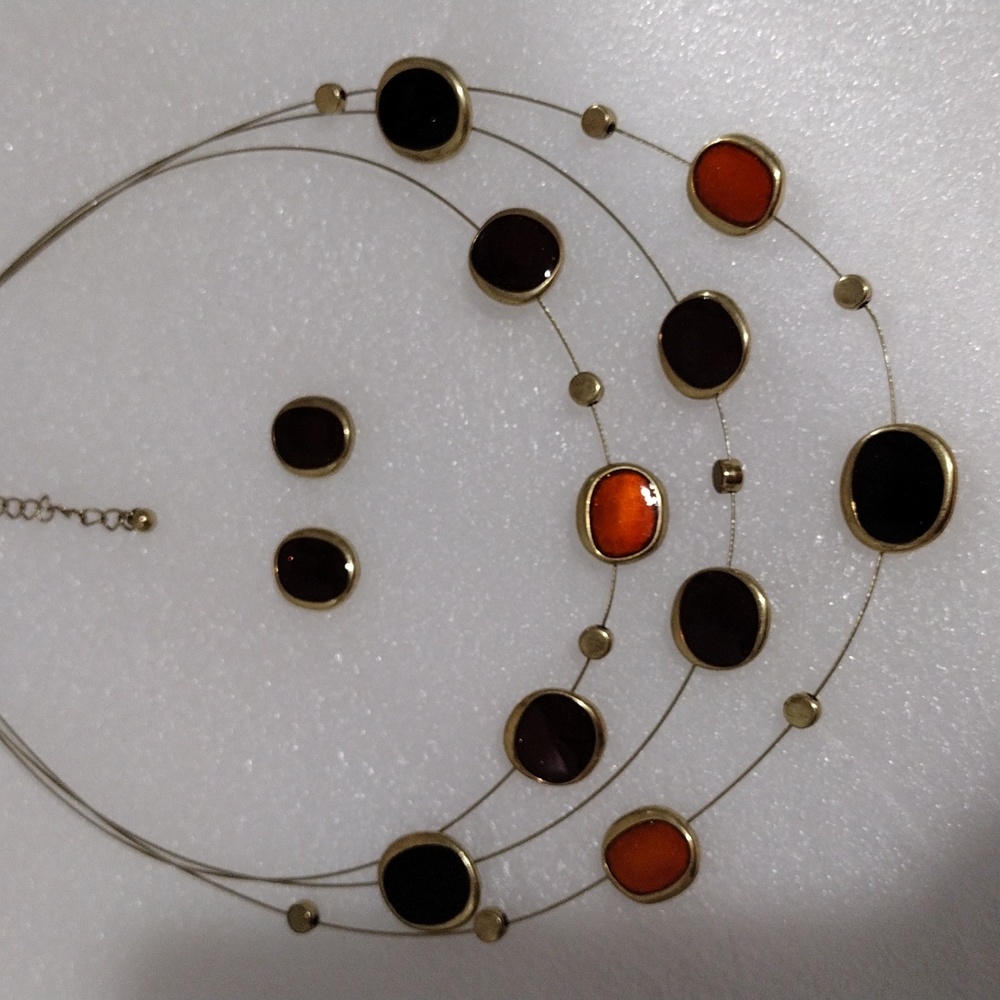 White Stag necklace and earring set.